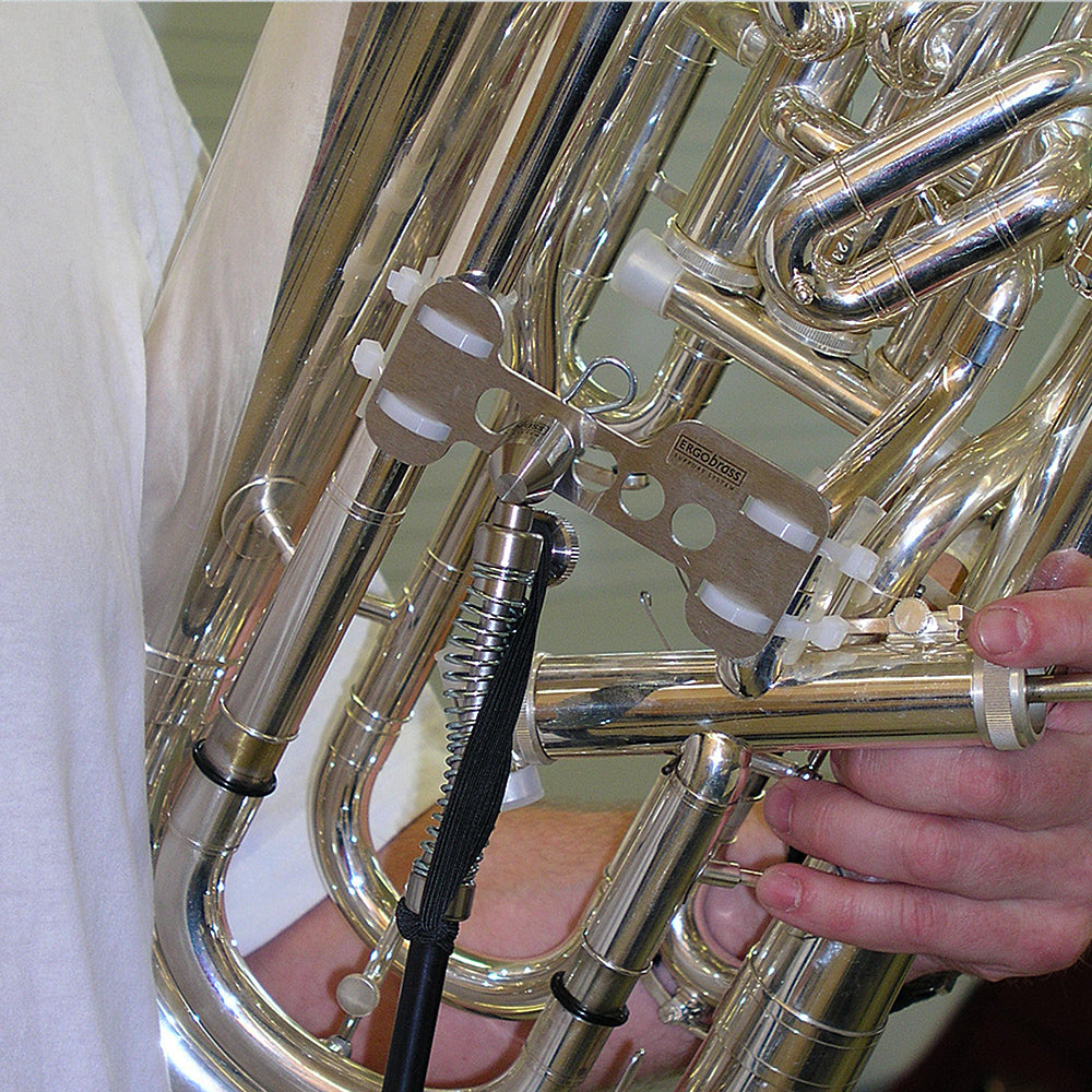 A close up of the ergobrass euphonium support system attached to a euphonium