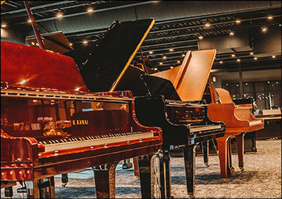 grand pianos in a row