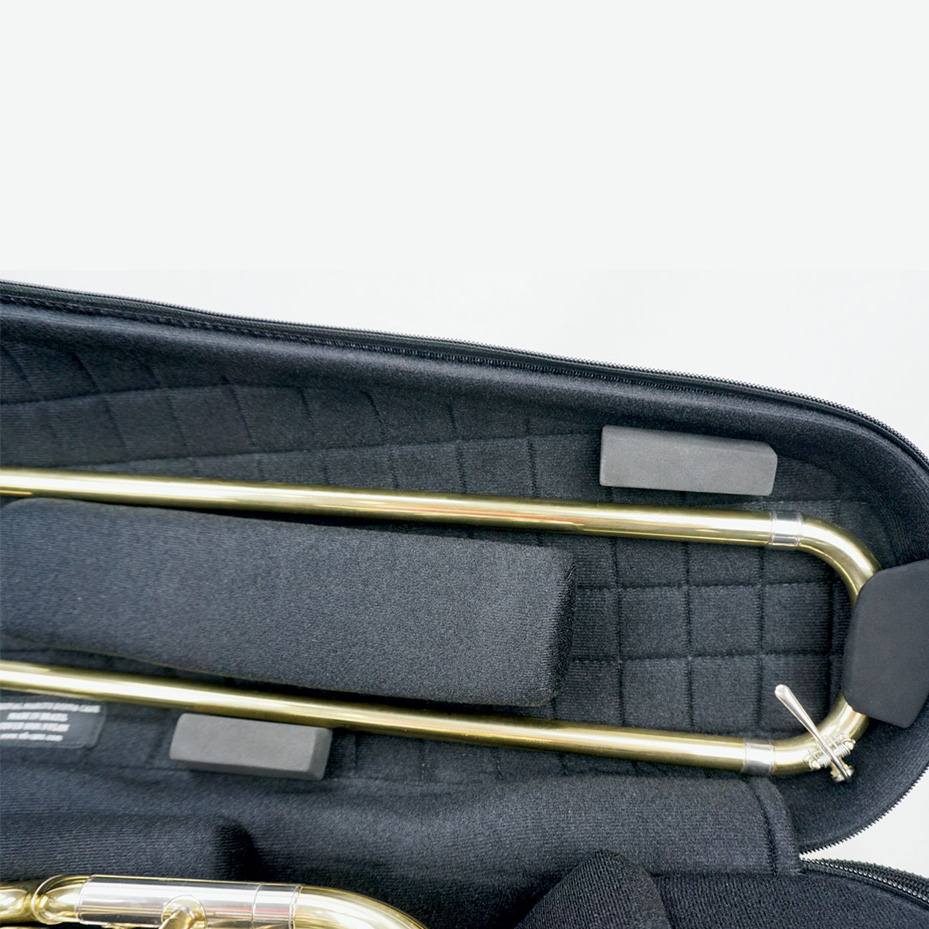 Marcus Bonna Bass Trombone Case - Black Nylon - close-up of a trombone slide fitted into the case