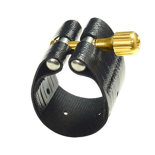 The Rovner Dark 2R saxophone ligature for a standard tenor saxophone mouthpiece, or a slim baritone saxophone mouthpiece. A leathered cloth with a brass nickel screw.