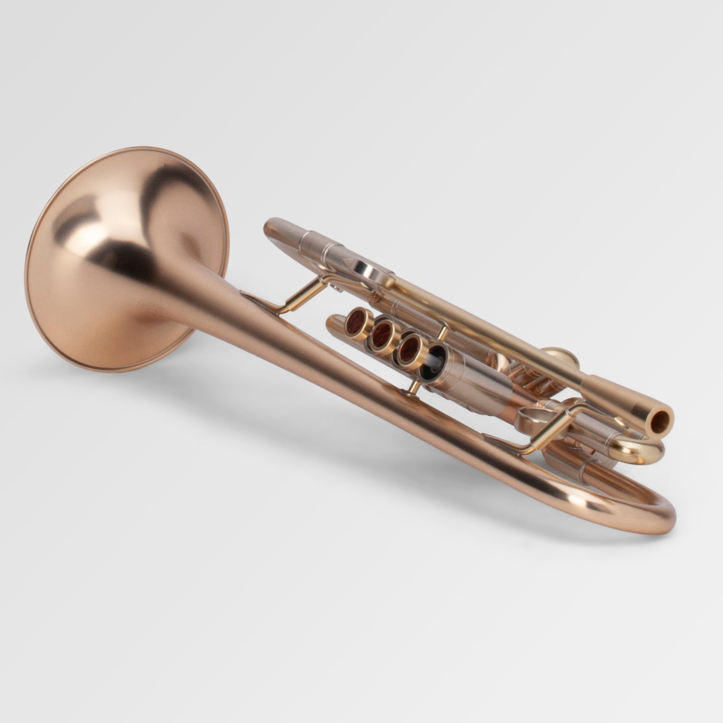 Adams A4 Bb Trumpet - laying down with valves facing slightly sideways