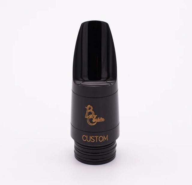 The B. Corbin Custom Bass Clarinet Mouthpiece with golden yellow engraving of brand logo