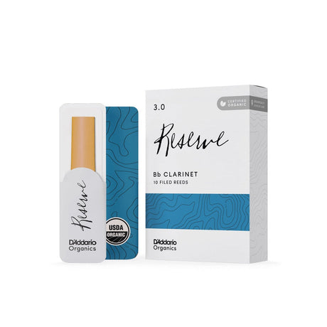 A Daddario Organic Reserve clarinet reed in its wrapping next to its box