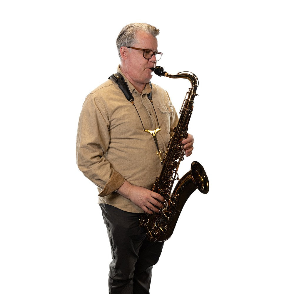 Lake City Saxophone Harness - worn by a person with a saxophone attached to it