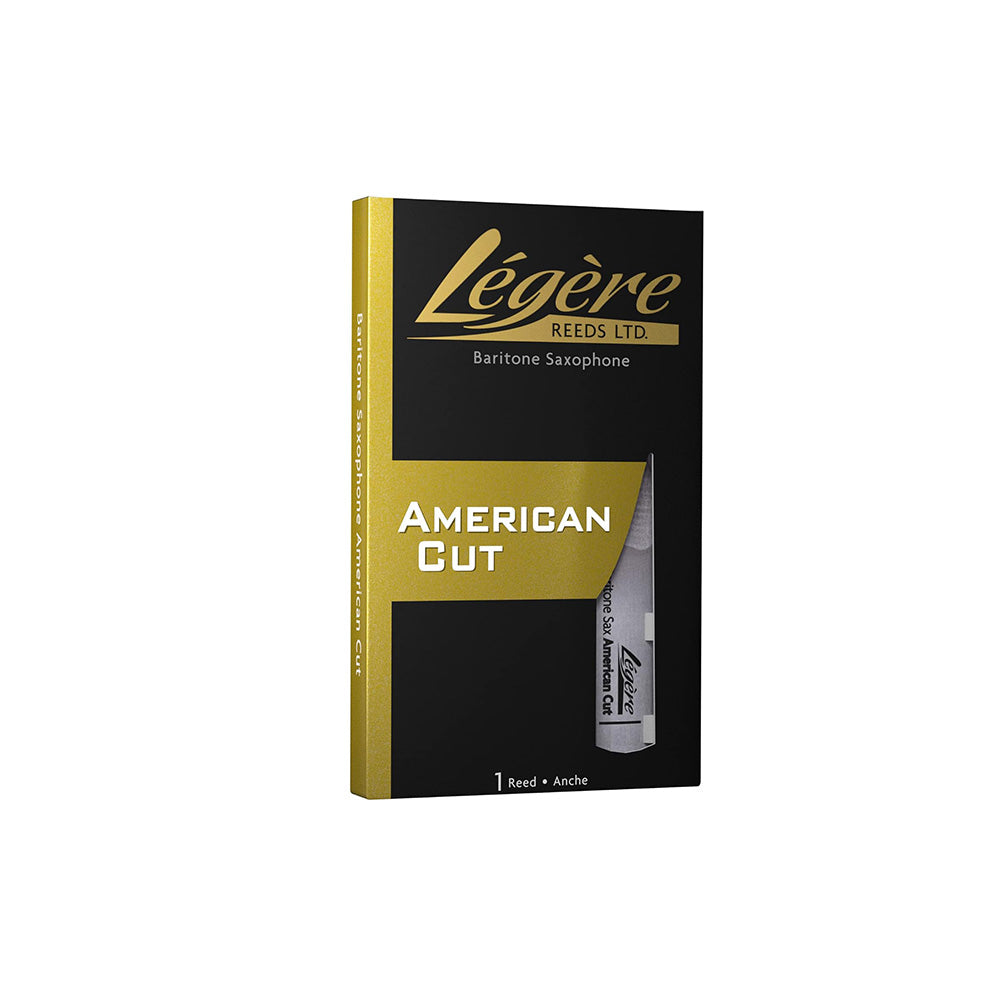 A Legere American Cut baritone saxophone reed in its packaging and one in its carrying case