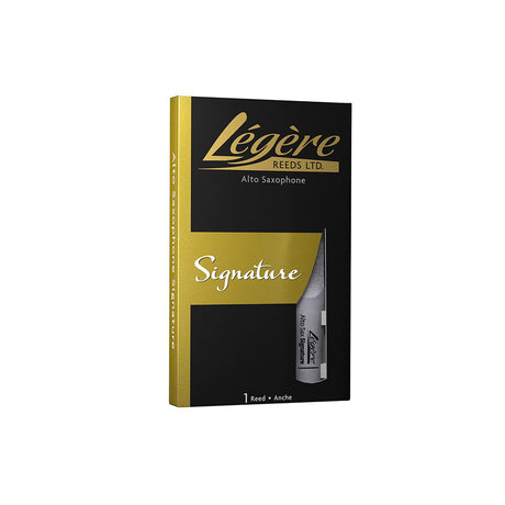 A Legere Signature alto saxophone reed in its packaging and one in its carrying case