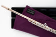 sempre|flute Cleaning Cloth - Flute Gallery, Limited Edition - folded on top of a flute case with the flute on top of it