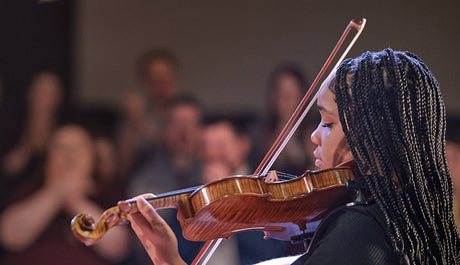 Young women playing the violin