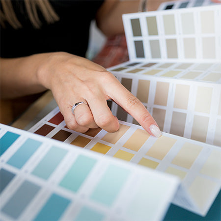 Person looking at color swatches