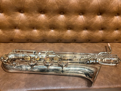 Consignment 1971 Selmer Mark VI Low A Baritone Saxophone - laying on a couch keys up