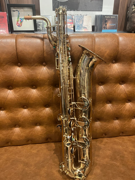 Consignment 1971 Selmer Mark VI Low A Baritone Saxophone - standing on a couch, keys facing forward