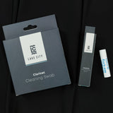 The Lake City Clarinet Bundle. Includes a clarinet cleaning swab, a mouthpiece brush, and a tube of cork grease. 