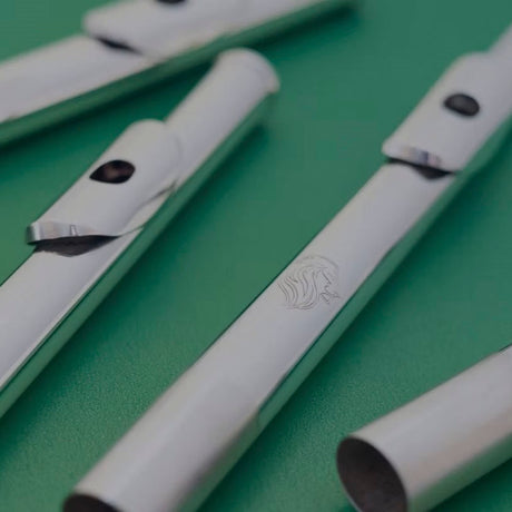  McChord Flute Headjoints on Green Background