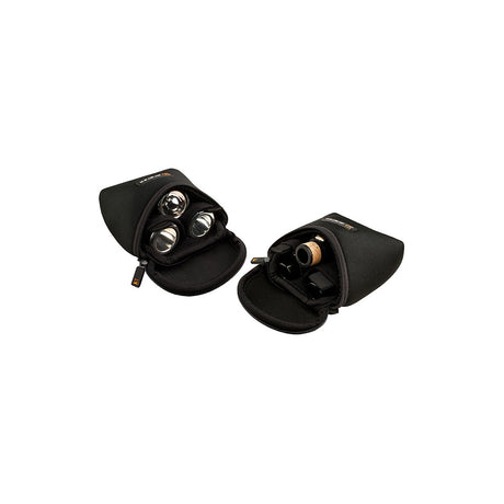 Two Protec N265 3-Piece mouthpiece pouches laying down with their tops unzipped. One of them has three brass mouthpieces in it, and the other has three woodwind mouthpieces in it.