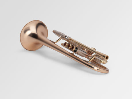 Adams A4 Bb Trumpet - laying down with valves facing slightly sideways