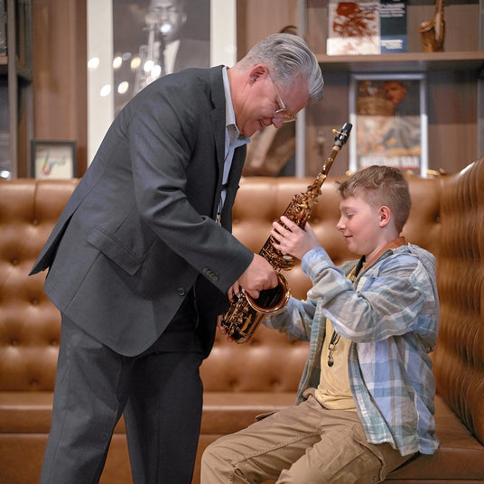 Daryk teaching a saxophone student