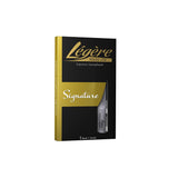 A Legere Signature soprano saxophone reed in its packaging and one in its carrying case