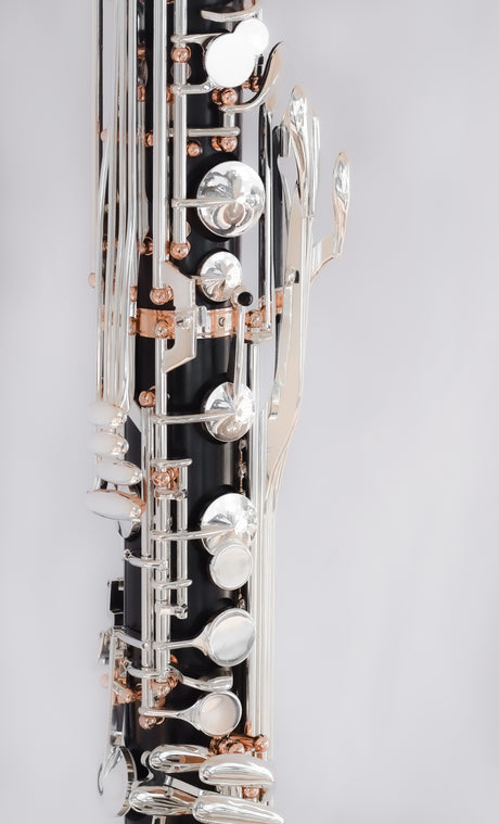 Royal Global Firebird Low C Bass Clarinet - close up of middle portion of the instrument with two joints connected
