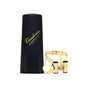 The gold plated Vandoren LC56DP MO soprano saxophone ligature and the plastic mouthpiece cap
