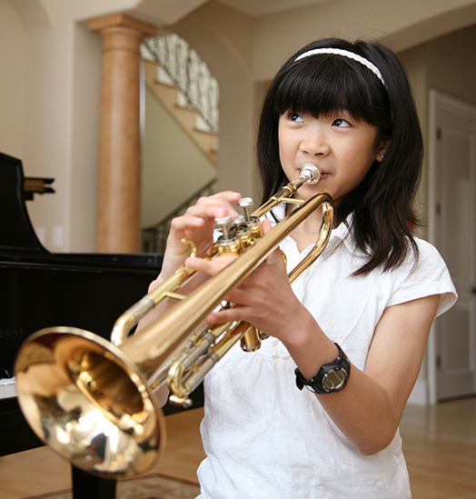 girl playing trumpet
