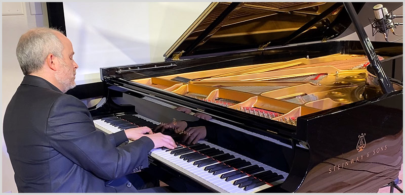 Dr. Chris Weldon, Steinway Concert Grand piano